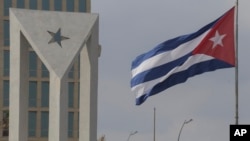 FILE - A Cuban flag flies outside the U.S. Embassy in Havana, Cuba, Jan. 14, 2025.