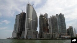 FILE - In this photo taken July 4, 2011, shows the Trump Ocean Club International Hotel and Tower, third building from left, in Panama City. U.S. business magnate Donald Trump will open his new hotel on July 6, 2011.