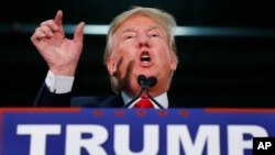 Republican presidential candidate Donald Trump speaks during a campaign event at the University of Iowa Field House, in Iowa City, Iowa, Jan. 26, 2016.