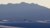 Rescuers: French Couple Likely Sacrificed Themselves for Son