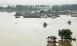 지난 2012년 7월 북한 평안남도 안주에서 폭우로 주택과 농지가 물에 잠겼다.