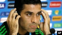 FILE - Mexico's soccer team captain Rafael Marquez Alvarez attends a news conference before training for the World Cup in the Arena das Dunas in Natal, Brazil, June 12, 2014.