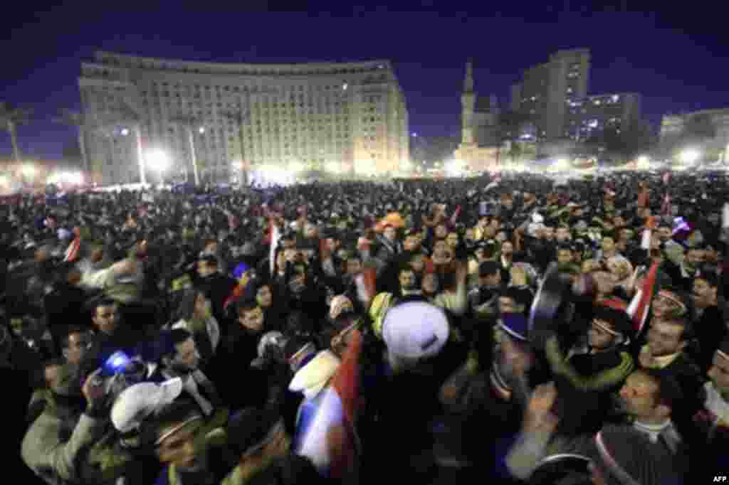 Anti-government protesters celebrate in Tahrir Square in downtown Cairo, Egypt Thursday, Feb. 10, 2011. Egypt's military announced on national television it had stepped in to secure the country and promised protesters calling for President Hosni Mubarak's