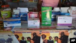 Malaria drugs are seen on display in a privately owned pharmacy in Blantyre, Malawi. (L. Masina/VOA). 