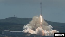 FILE - A SpaceX Falcon 9 rocket lifts off carrying the NASA/German Research Centre for Geosciences GRACE Follow-On spacecraft from Space Launch Complex 4E at Vandenberg Air Force Base, California, May 22, 2018. NASA/Bill Ingalls/Handout via REUTERS