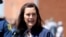 FILE - Michigan Governor Gretchen Whitmer addresses the media in downtown Midland, Michigan, May 20, 2020.