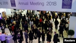 Attendees are seen during the World Economic Forum annual meeting in Davos, Switzerland, Jan. 24, 2018. 