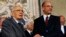 Italian Prime Minister-designate and deputy leader of the centre-left Democratic Party (PD) Enrico Letta (R) shakes hands with President Giorgio Napolitano at the Quirinale Palace in Rome, April 27, 2013. 