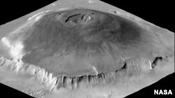 The massive Olypus Mons volcano on Mars is seen in this NASA photo. 