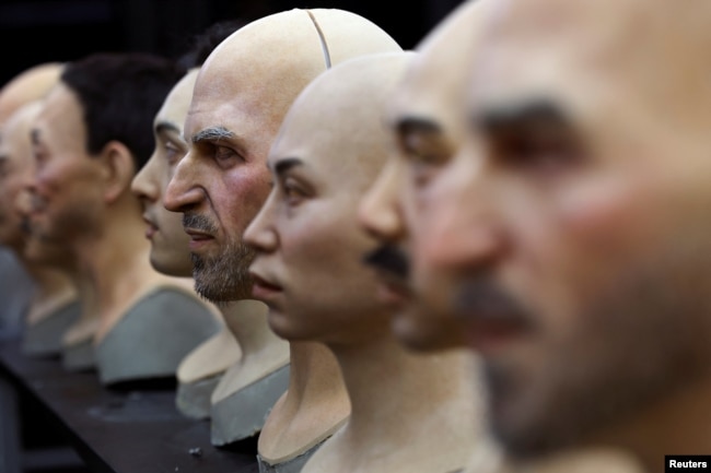 Heads for humanoid robots sit on a table at the office of developer Ex-Robots in Dalian, Liaoning province, China June 6, 2024. (REUTERS/Florence Lo)