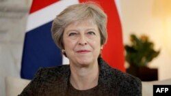 Theresa May lors d'une réunion à 10 Downing Street à Londres, le 24 juillet 2018.