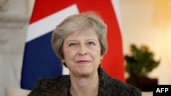 Theresa May lors d'une réunion à 10 Downing Street à Londres, le 24 juillet 2018.