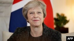 Theresa May lors d'une réunion à 10 Downing Street à Londres, le 24 juillet 2018.