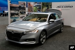 This car, made by the automaker Honda, is a 2018 Honda Accord shown at the Pittsburgh Auto Show Thursday on February 15, 2018. (AP Photo/Gene J. Puskar)