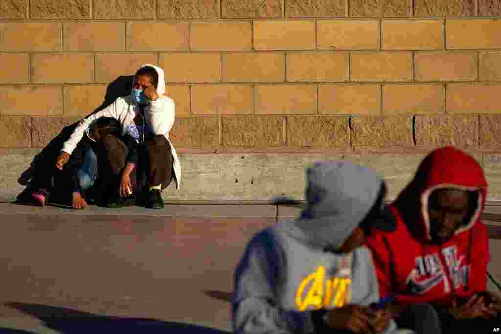 Asylum-seekers wait for news of policy changes at the border in Tijuana, Mexico. After waiting months in Mexico, people seeking asylum in the U.S. are being allowed into the country starting Feb. 19, 2021, as they wait for courts to decide on their cases.