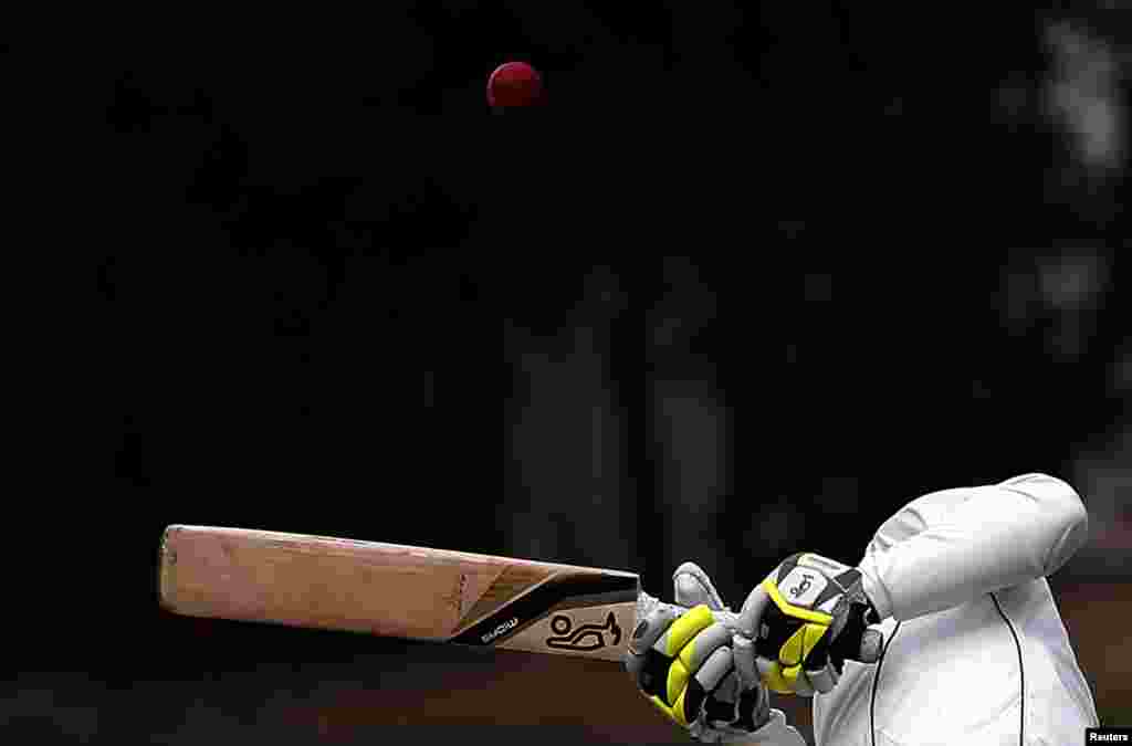 New Zealand's Bruce Martin avoids a bouncer bowled by England's Stuart Broad during the fourth day of the first test at the University Oval in Dunedin, New Zealand.