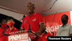 Trinidad and Tobago Prime Minister Keith Rowley addresses the audience while claiming victory for his ruling party in a general election in Port of Spain, Aug. 11, 2020.