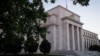 US Central Bank Reduces Monthly Bond Purchases to $65 Billion