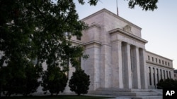 FILE - The Federal Reserve headquarters in Washington, D.C. 