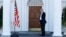 President-elect Donald Trump gives the thumbs-up after Mitt Romney leaves Trump National Golf Club Bedminster in Bedminster, N.J., Nov. 19, 2016. 