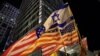 People gather outside the hotel where U.S. Secretary of State Antony Blinken is due to stay during a visit to Israel, in Tel Aviv