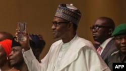 Le président nigérian Muhammadu Buhari lors du 66e anniversaire du leader du All Progress Progress (APC) Asiwaju Bola Tinubu, à Lagos, le 29 mars 2018.