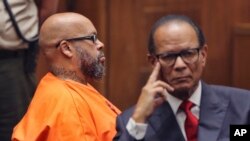 Marion "Suge" Knight, left, and his defense attorney, Albert DeBlanc Jr., appear in court in Los Angeles, Oct. 4, 2018. A judge sentenced him to 28 years in prison for the 2015 death of man he ran over outside a Compton burger stand.