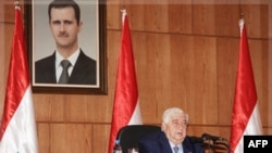 Sirijski ministar inostranih poslova Valid al-Moalem na konferenciji za novinare u Damasku