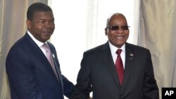 In this photo supplied by South African Communication and Information Services (GCIS), Angolan President Joao Lourenco, left, and his South African counterpart Jacob Zuma, meet in Luanda, Angola, Nov. 21 2017. 