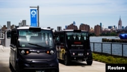 FILE - Optimus Ride launches a self-driving car at the Brooklyn Navy Yard in the Brooklyn borough of New York City, Aug. 5, 2019.