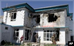 ساختمان آسیب دیده کمیشنری عالی پناهندگان ملل متحد در قندهار از اثر حمله انتحاری