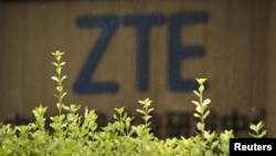 FILE - The logo of China's ZTE Corp is seen at the lobby of ZTE Beijing research and development center building in Beijing, China, June 13, 2018.