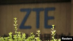 FILE - The logo of China's ZTE Corp is seen at the lobby of ZTE Beijing research and development center building in Beijing, China, June 13, 2018. 