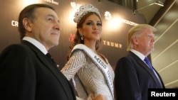 FILE - Miss Universe 2013 Gabriela Isler, Donald Trump, co-owner of the Miss Universe Organization, and businessman Aras Agalarov take part in a news conference after the Miss Universe pageant at the Crocus City Hall in Moscow Nov. 9, 2013.