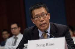 FILE - Chinese human rights lawyer Teng Biao speaks at a hearing on Capitol in Washington, Sept. 18, 2015.