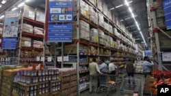 Customers shop at a Best Price Modern Wholesale store, a joint venture of WalMart Stores Inc. and Bharti Enterprises, at Zirakpur, India, Nov. 24, 2011.