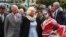 Britain's Prince Charles, front left, and his wife, Camilla, Duchess of Cornwall, are welcomed during the Day of the Dead celebrations in Pachuca, in the Mexican state of Hidalgo, Nov. 2, 2014. 