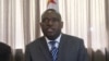 FILE - Zimbabwe's new foreign minister, Sibusiso Moyo, is pictured addressing diplomats and reporters this month in Harare, Zimbabwe. (S. Mhofu/VOA)