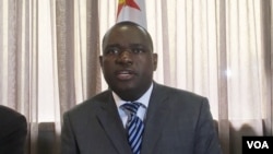 FILE - Zimbabwe's new foreign minister, Sibusiso Moyo, is pictured addressing diplomats and reporters this month in Harare, Zimbabwe. (S. Mhofu/VOA)