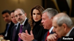 Jordan's King Abdullah and wife Queen Rania are seen during their meeting with U.S. Vice President Mike Pence and wife Karen Pence (not pictured) at the Royal Palace in Amman, Jordan, Jan. 21, 2018.