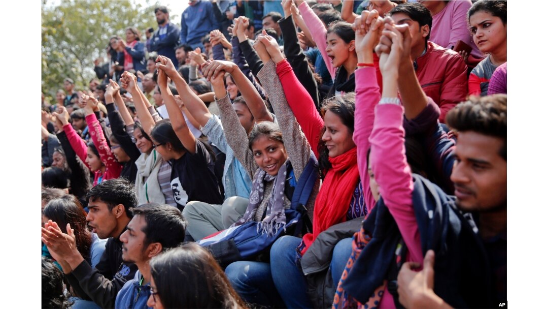 Indian students shout slogans during a protest at Jawaharlal Nehru University against the arrest of a student union leader in New Delhi, India, Feb. 16, 2016.