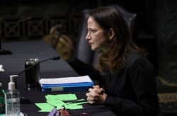 President Joe Biden’s pick for national intelligence director Avril Haines speaks during a confirmation hearing before the Senate intelligence committee on Jan. 19, 2021, in Washington.