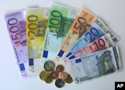 FILE - Euro currency.