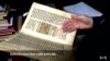 Iraqi Priest Rescues Ancient Manuscripts from IS Destruction