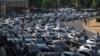 French Minister Urges UberPOP Ban as Taxi Protest Blocks Airports