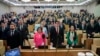 Russian lawmakers listen to the national anthem prior to a session at the State Duma, the lower house of the Russian Parliament in Moscow, Russia, Dec. 17, 2024.