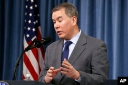 FILE - Undersecretary of Defense for Policy John Rood, speaks during a news conference on the 2018 Nuclear Posture Review, at the Pentagon, Feb. 2, 2018.