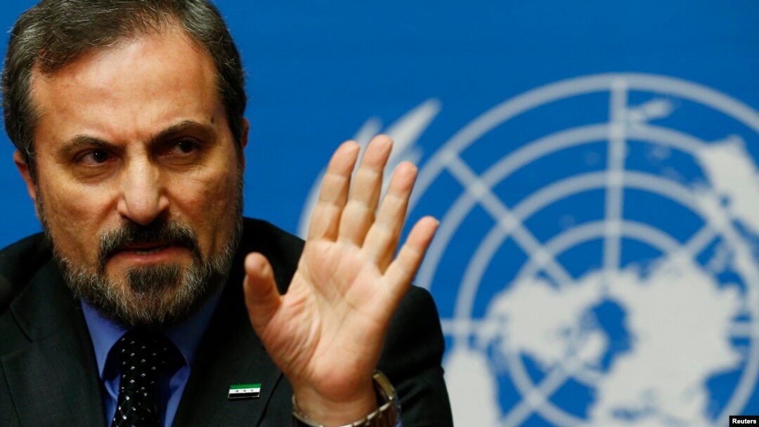 Louay Safi, spokesperson for the Syrian National Coalition, addresses a news conference at the United Nations European headquarters in Geneva, Feb. 14, 2014. 