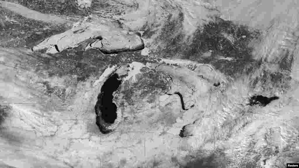 Ice cover on the Great Lakes is seen in a NASA image taken by the GOES-East satellite on Feb. 19, 2014.