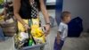 Currency Devaluation Baffles Shortage-plagued Venezuelans